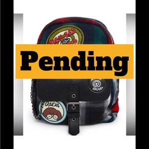 Plaid Backpack with Unique Patches
